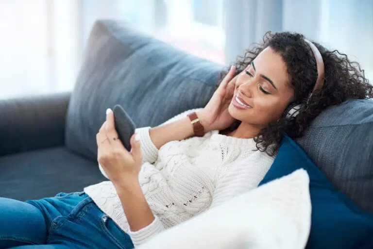 Women-at-home-relaxed-listening-to-music-after-getting-treatment-for-depression-in-greenville-sc-768x513.jpg
